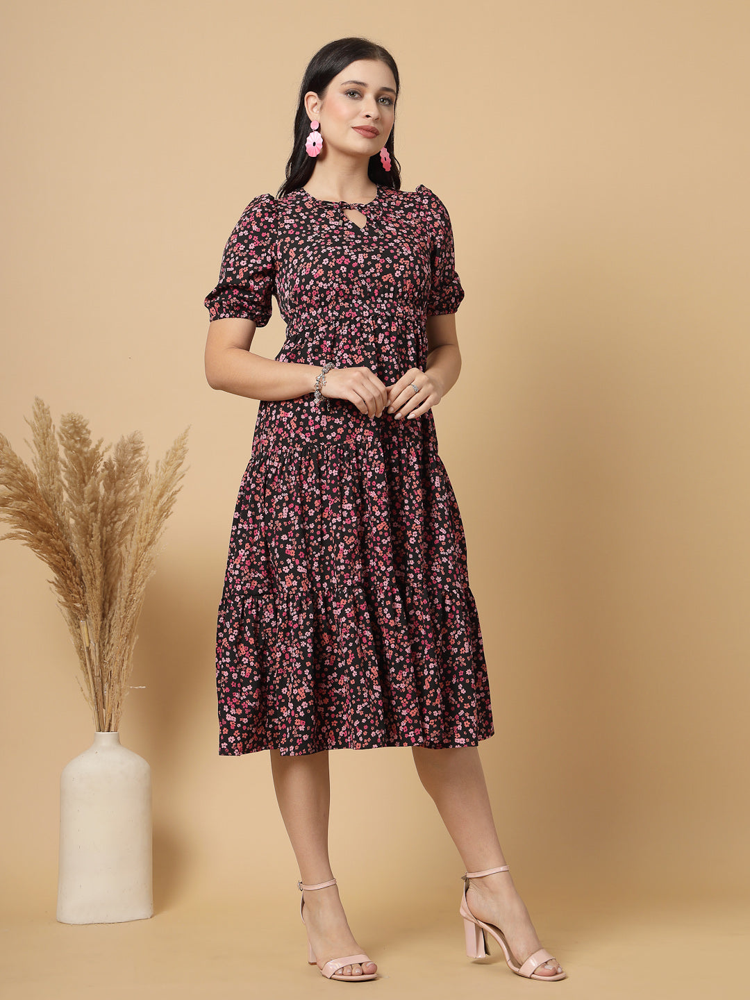 Tiered to perfection, this tier midi dress features a comfortable elasticated waist that creates a flawless fit-and-flare silhouette. Dress it up or down for effortless style.
This elegant tier dress effortlessly defines your shape, creating a feminine silhouette that's perfect for any occasion.