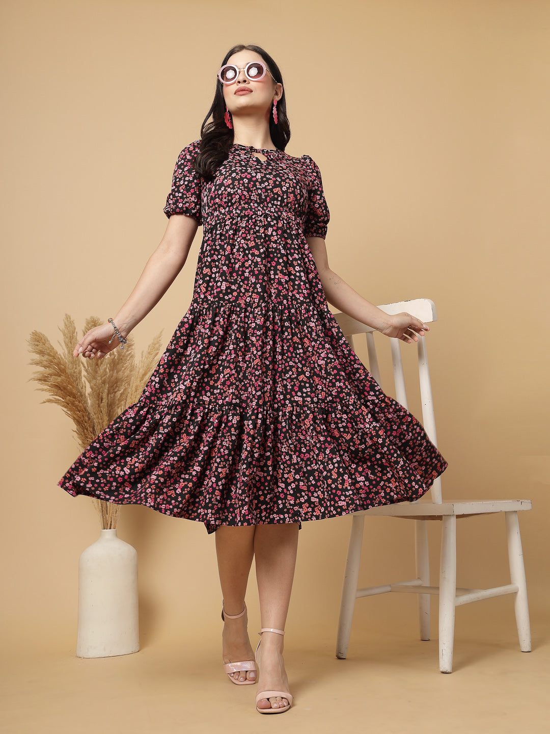 Tiered to perfection, this tier midi dress features a comfortable elasticated waist that creates a flawless fit-and-flare silhouette. Dress it up or down for effortless style.
This elegant tier dress effortlessly defines your shape, creating a feminine silhouette that's perfect for any occasion.