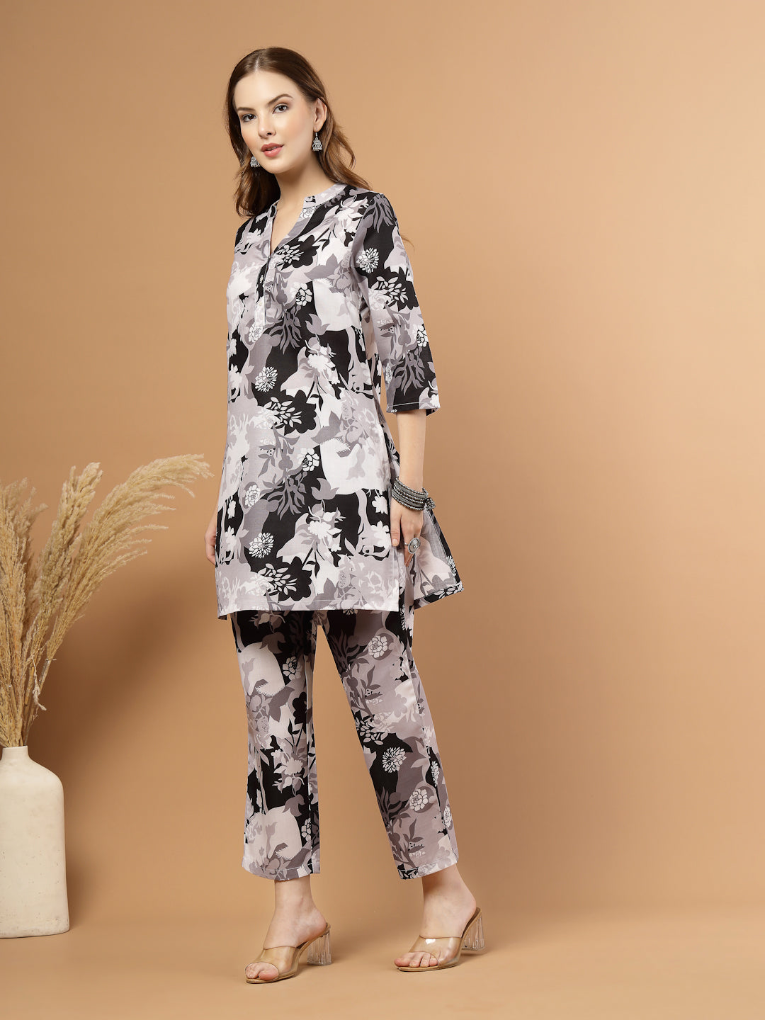 Black and white tropical printed kurta with matching bottoms, featuring soft breathable fabric and coordinated design for casual or festive wear.