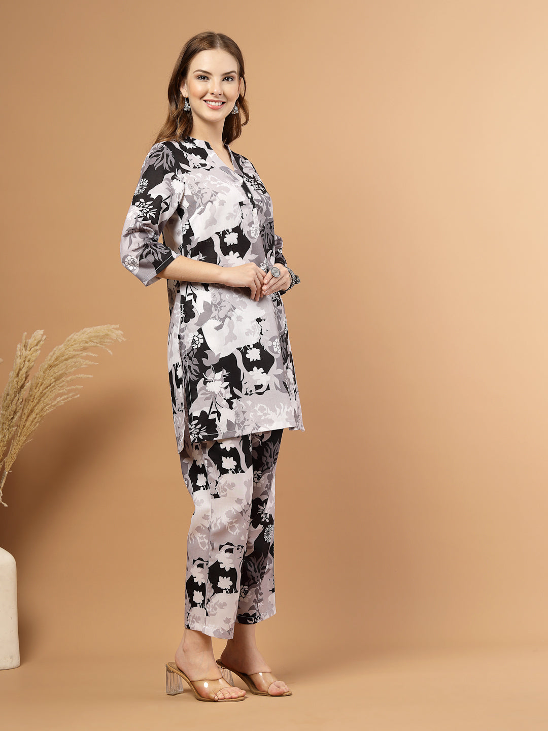 Black and white tropical printed kurta with matching bottoms, featuring soft breathable fabric and coordinated design for casual or festive wear.