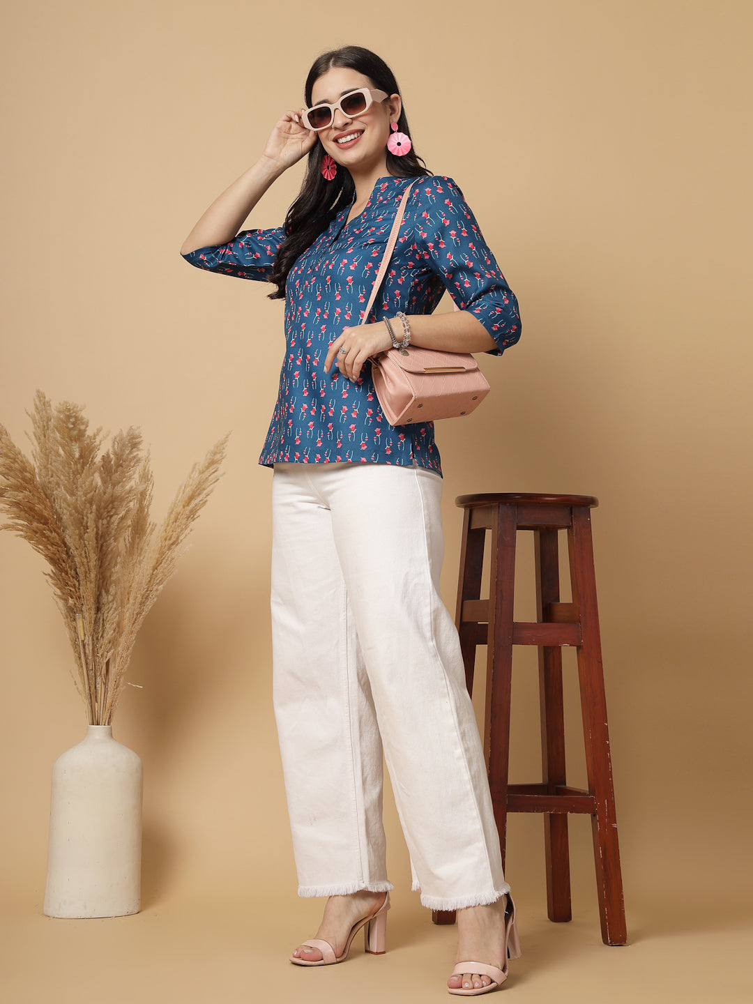 A modern take on a classic. This hip-length Printed kurta top offers a band collar, button-front, and a breezy, loose silhouette. Perfect, for office & casual outings.
Dress it up or down for any occasion.
