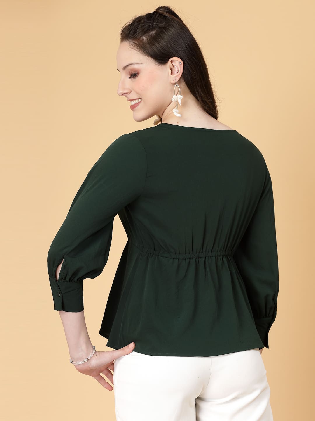 Effortlessly chic. Work-ready. This solid blouse with pintuck detail adds a touch of polish to your Formal outfit. Cuffed sleeves, drawstring waist, and pintuck charm. Dress it up or down this blouse does it all.
Solid color, pintuck detail, and a touch of cinch. Your new Formal blouse For Work.