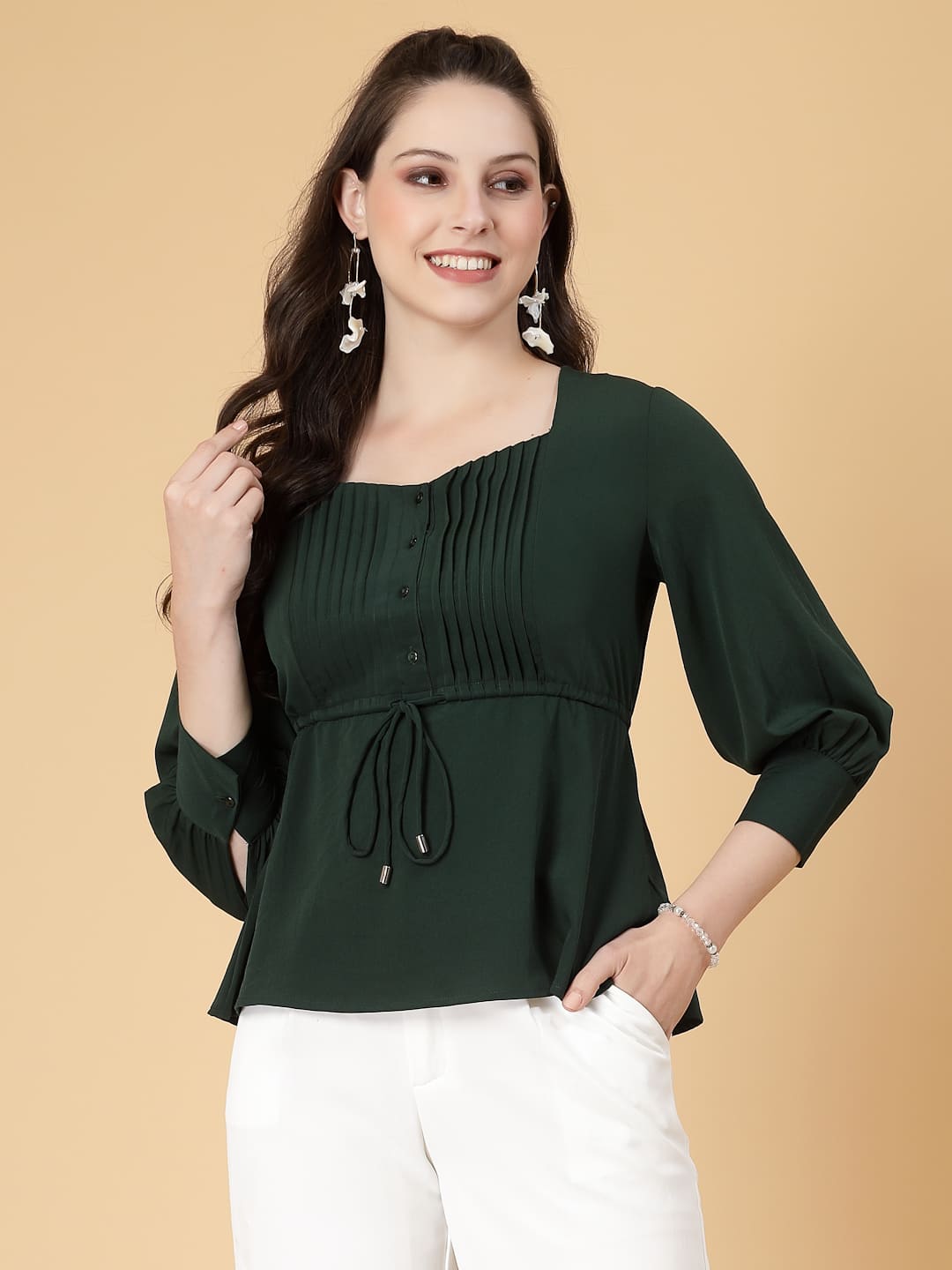 Effortlessly chic. Work-ready. This solid blouse with pintuck detail adds a touch of polish to your Formal outfit. Cuffed sleeves, drawstring waist, and pintuck charm. Dress it up or down this blouse does it all.
Solid color, pintuck detail, and a touch of cinch. Your new Formal blouse For Work.