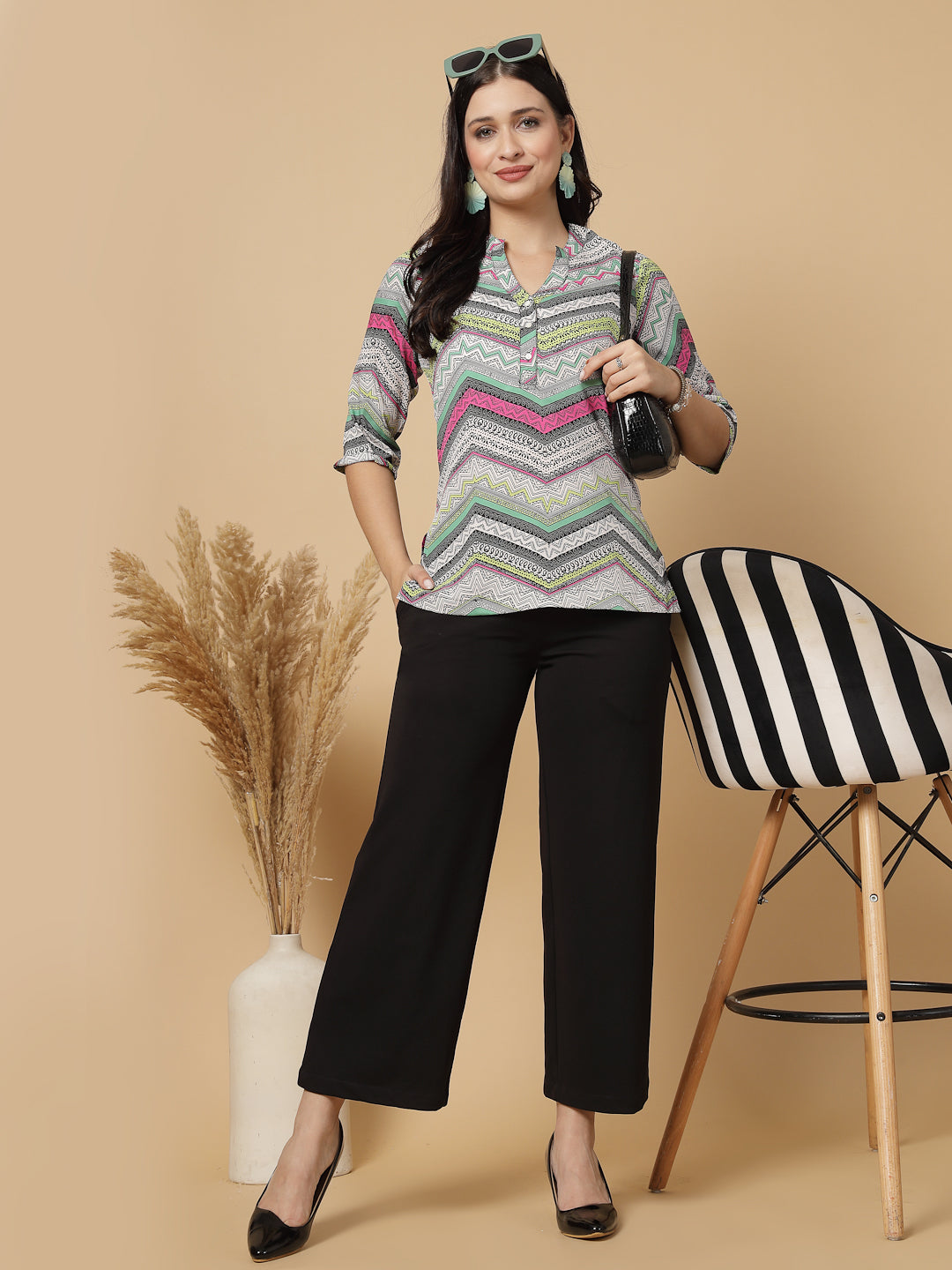 A modern take on a classic. This hip-length Printed kurta top offers a band collar, button-front, and a breezy, loose silhouette. Perfect, for office & casual outings.
Dress it up or down for any occasion.