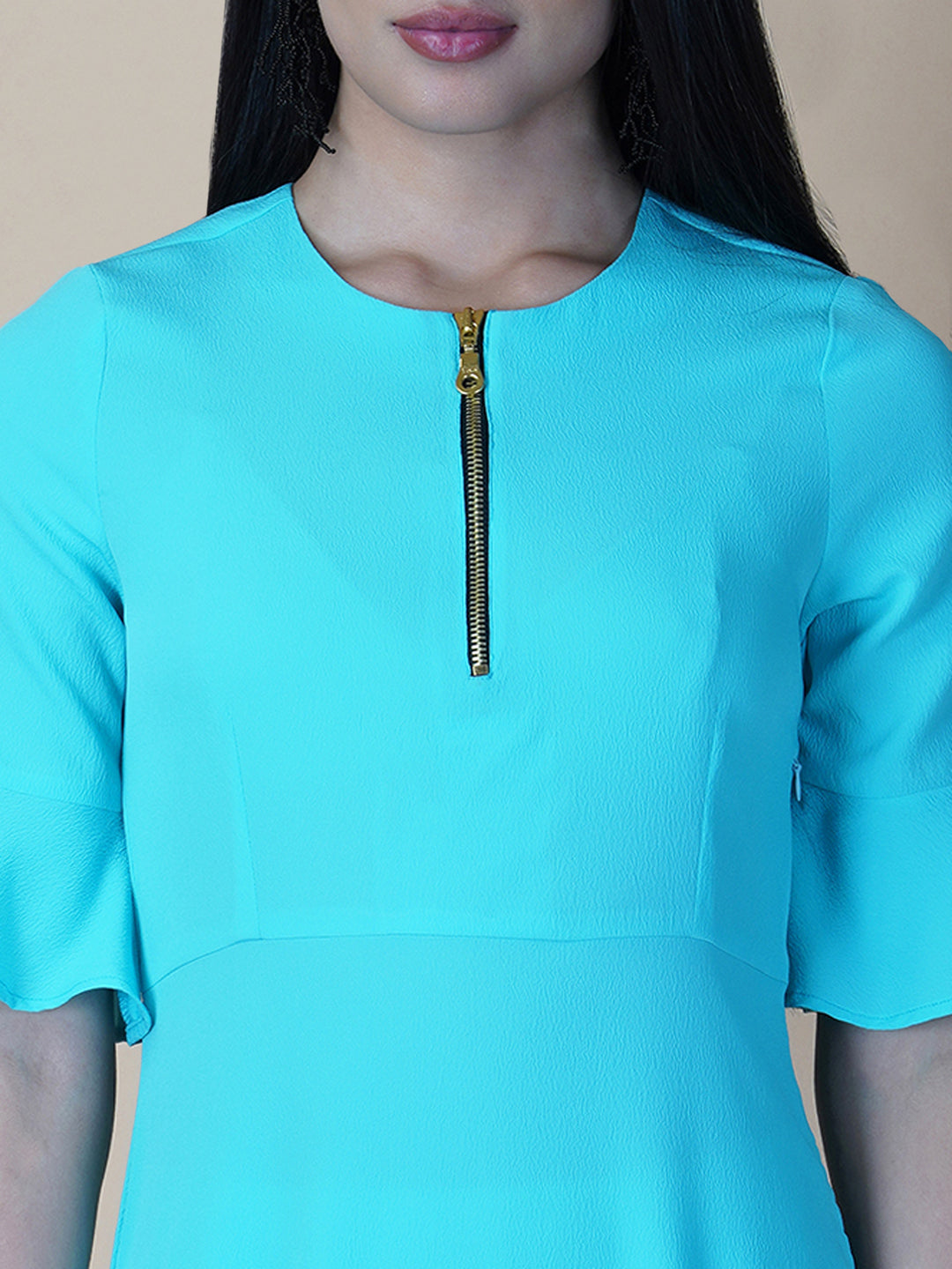 Turquoise color A Line Women's Dress with a Metallic Zipper is a stylish and sophisticated garment that is perfect for a variety of occasions. The burgundy color is a rich and deep shade that adds a touch of elegance to the dress, while the A-line cut is flattering and comfortable.
