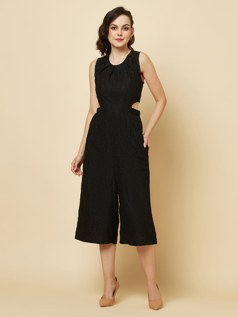The Black Floral Mesh Side Waist Cut Jumpsuit for Women is a stylish and elegant outfit that features a vibrant black floral pattern and mesh detailing on the sides. This jumpsuit for women is designed to accentuate the waistline with a flattering cut, making it a great choice for any formal occasion or dressy event. It is comfortable to wear and made from high-quality materials, ensuring both style and comfort.
