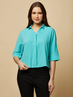 Turquoise Color Over Size Shirt for Women! This vibrant and eye-catching top is the perfect choice for fashion-forward women who want to stand out from the crowd. With its bold turquoise hue and oversized fit, it's the perfect combination of comfort and style. Whether you're dressing up for a night out or keeping it casual for a day out with friends, this shirt is sure to become your new go-to. 