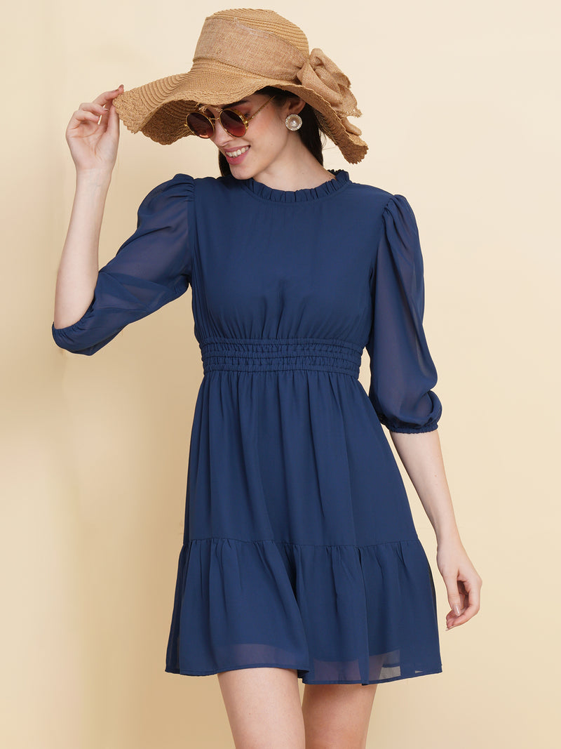 Step into style and embrace your femininity with our stunning blue short dress for women!  Featuring a ruched waist and a playful ruffled hem, this dress effortlessly combines elegance and flirtiness. It's the perfect choice for any occasion, whether it's a brunch date or a night out on the town.