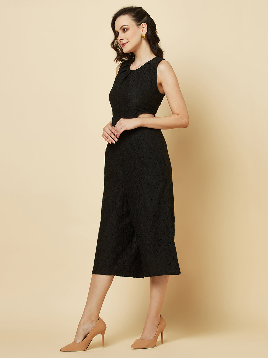 The Black Floral Mesh Side Waist Cut Jumpsuit for Women is a stylish and elegant outfit that features a vibrant black floral pattern and mesh detailing on the sides. This jumpsuit for women is designed to accentuate the waistline with a flattering cut, making it a great choice for any formal occasion or dressy event. It is comfortable to wear and made from high-quality materials, ensuring both style and comfort.