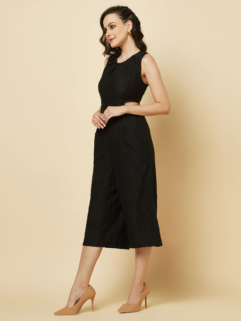 The Black Floral Mesh Side Waist Cut Jumpsuit for Women is a stylish and elegant outfit that features a vibrant black floral pattern and mesh detailing on the sides. This jumpsuit for women is designed to accentuate the waistline with a flattering cut, making it a great choice for any formal occasion or dressy event. It is comfortable to wear and made from high-quality materials, ensuring both style and comfort.