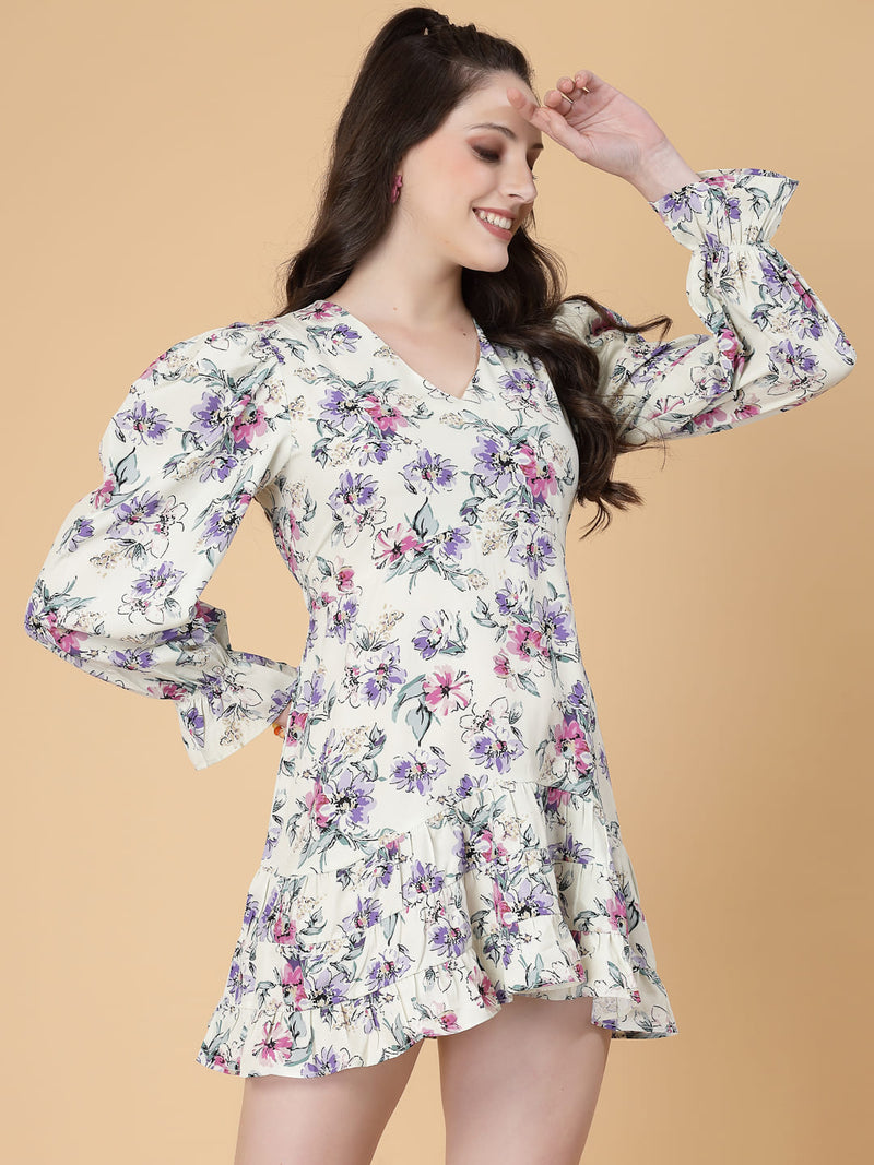 Stylish and comfortable floral dress with long sleeves, elasticated waist, and a flattering frilled hem.
