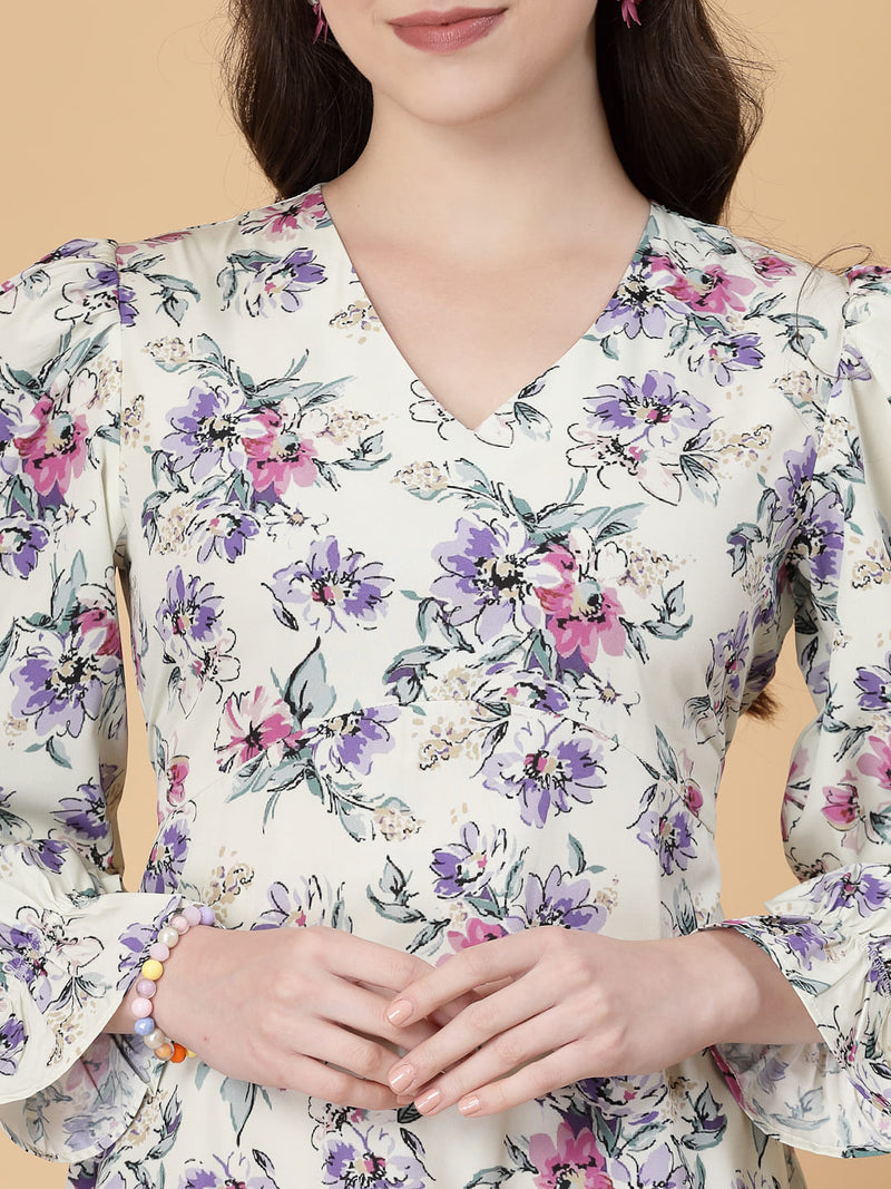 Stylish and comfortable floral dress with long sleeves, elasticated waist, and a flattering frilled hem.
