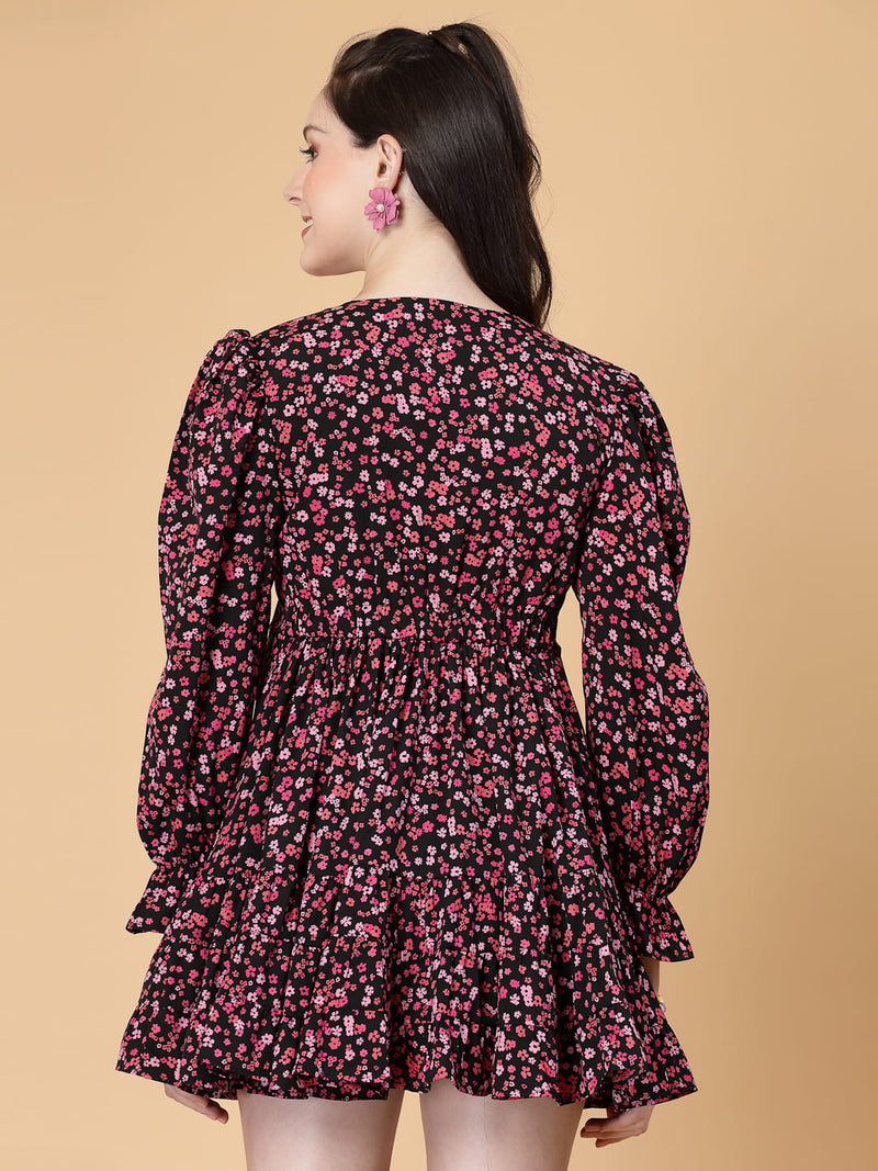 Stylish and comfortable floral dress with long sleeves, elasticated waist, and a flattering frilled hem.
