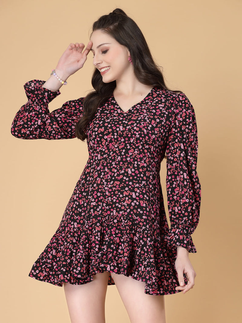 Stylish and comfortable floral dress with long sleeves, elasticated waist, and a flattering frilled hem.
