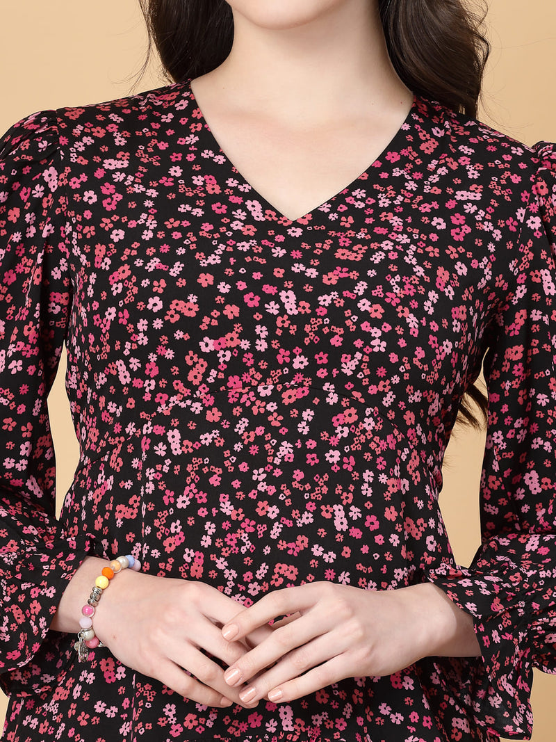 Stylish and comfortable floral dress with long sleeves, elasticated waist, and a flattering frilled hem.
