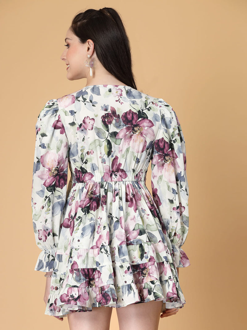 Stylish and comfortable floral dress with long sleeves, elasticated waist, and a flattering frilled hem.
