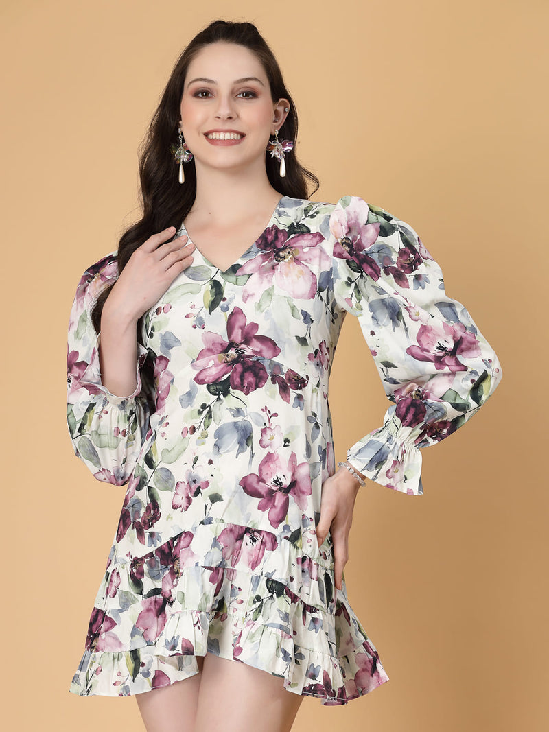 Stylish and comfortable floral dress with long sleeves, elasticated waist, and a flattering frilled hem.
