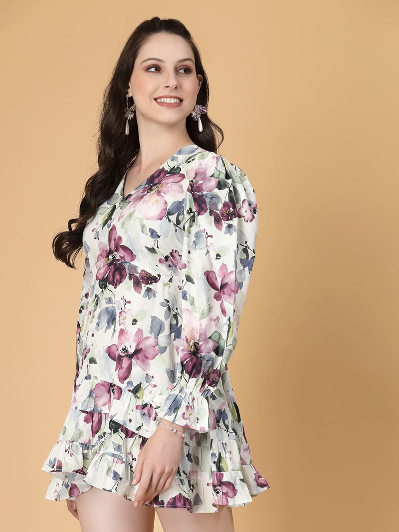 Stylish and comfortable floral dress with long sleeves, elasticated waist, and a flattering frilled hem.
