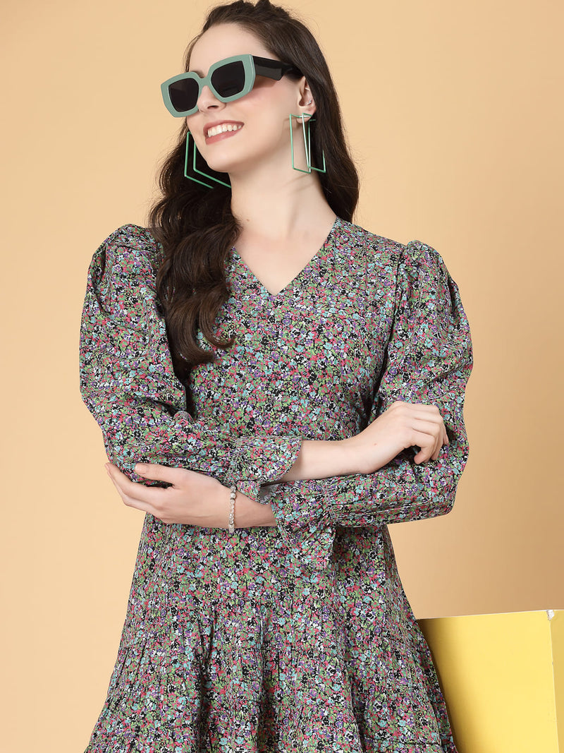 Stylish and comfortable floral dress with long sleeves, elasticated waist, and a flattering frilled hem.
