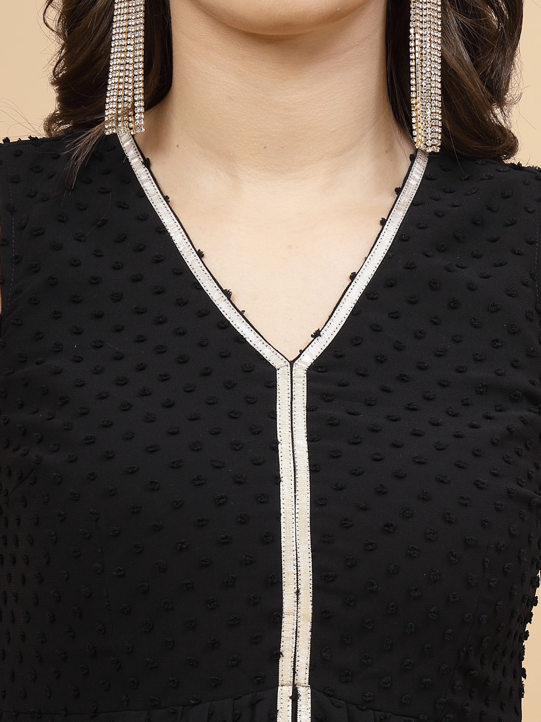 High Low Traditional maxi dresses in black color is a trendy and comfortable dress for  women in georgette with Swiss dot texture. Tailored with V-neck and high low pattern. Finished with a zip closure. It comes with a attached lining.