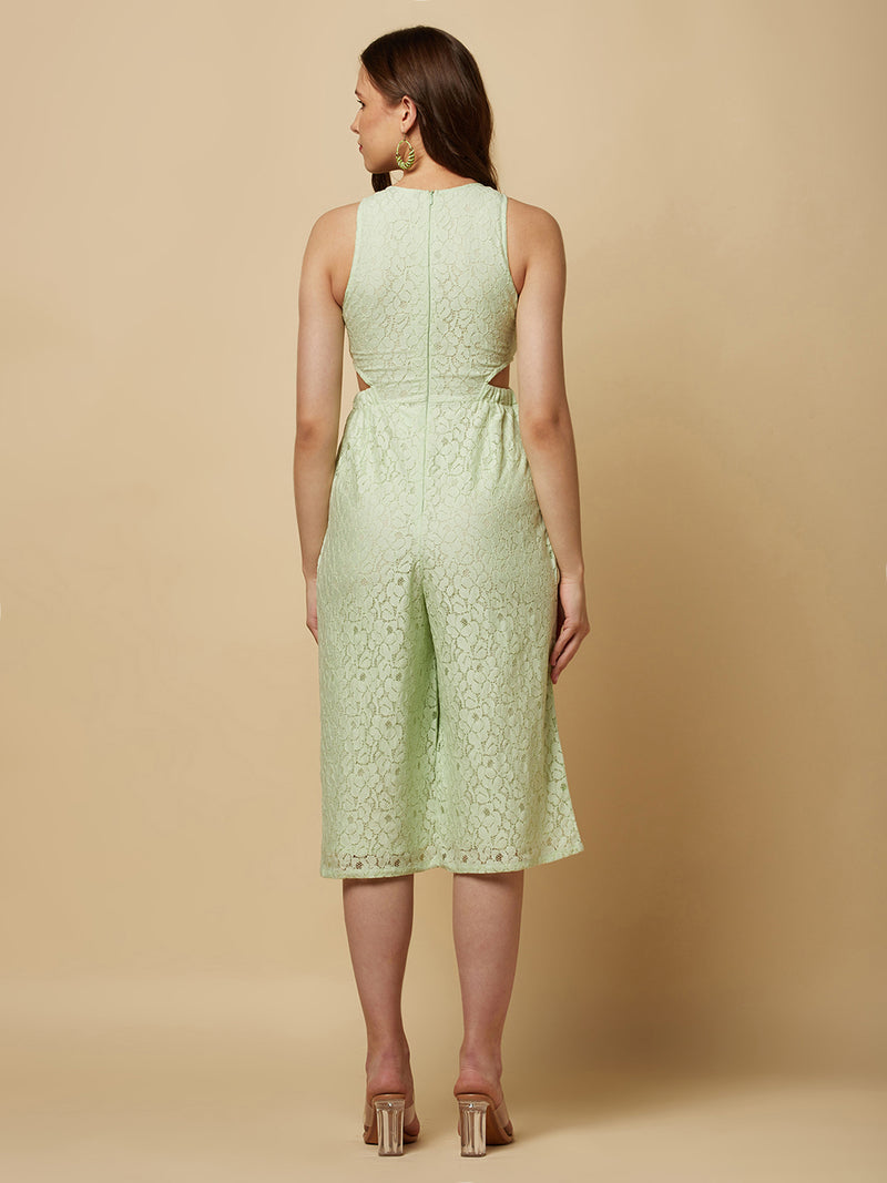The Green Floral Mesh Side Waist Cut Women Jumpsuit is a stylish and elegant outfit that features a vibrant green floral pattern and mesh detailing on the sides. The jumpsuit is designed to accentuate the waistline with a flattering cut, making it a great choice for any formal occasion or dressy event. It is comfortable to wear and made from high-quality materials, ensuring both style and comfort.