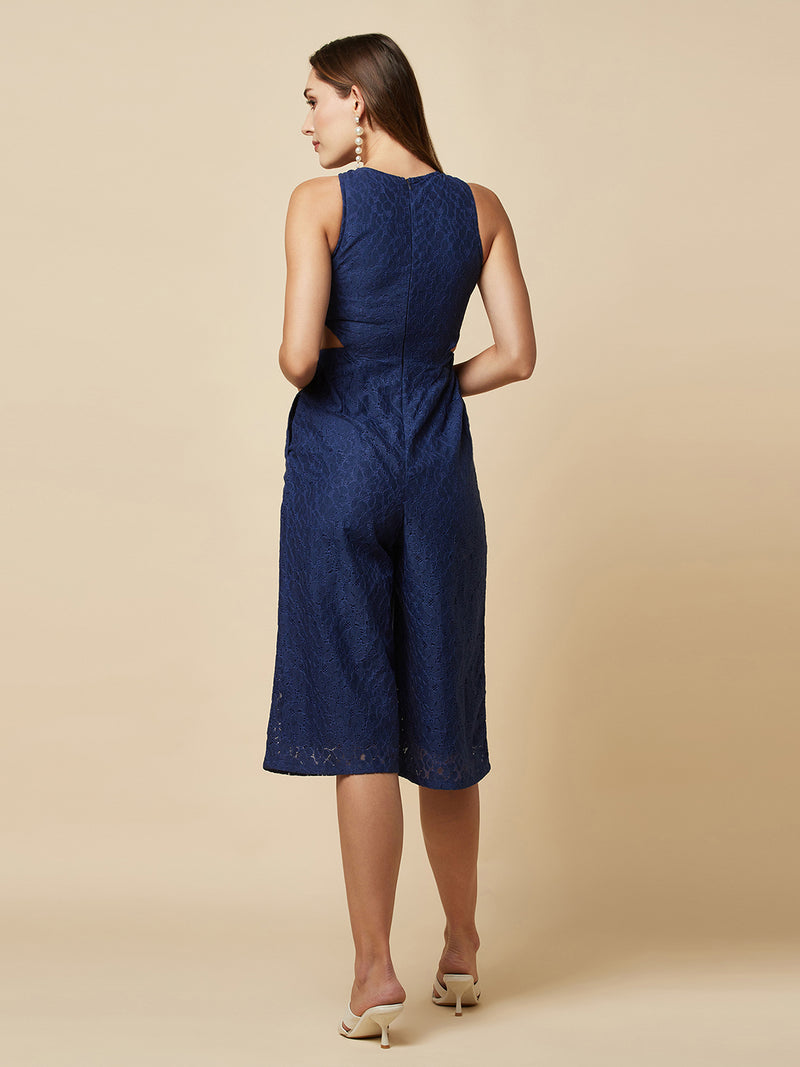 The blue Floral Mesh Side Waist Cut Jumpsuit for Women is a stylish and elegant outfit that features a vibrant blue floral pattern and mesh detailing on the sides. This women jumpsuit is designed to accentuate the waistline with a flattering cut, making it a great choice for any formal occasion or dressy event. This jumpsuit for women is comfortable to wear and made from high-quality materials, ensuring both style and comfort.
