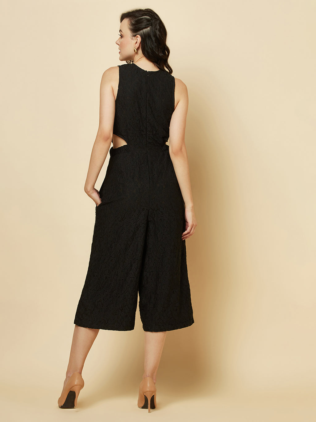 The Black Floral Mesh Side Waist Cut Jumpsuit for Women is a stylish and elegant outfit that features a vibrant black floral pattern and mesh detailing on the sides. This jumpsuit for women is designed to accentuate the waistline with a flattering cut, making it a great choice for any formal occasion or dressy event. It is comfortable to wear and made from high-quality materials, ensuring both style and comfort.