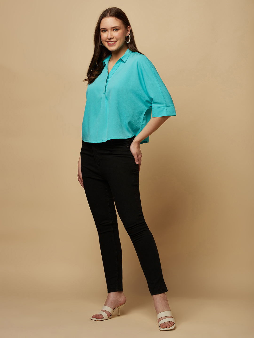 Turquoise Color Over Size Shirt for Women! This vibrant and eye-catching top is the perfect choice for fashion-forward women who want to stand out from the crowd. With its bold turquoise hue and oversized fit, it's the perfect combination of comfort and style. Whether you're dressing up for a night out or keeping it casual for a day out with friends, this shirt is sure to become your new go-to.