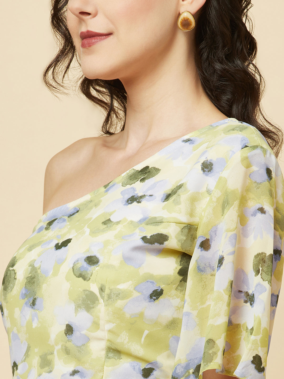 Green floral printed palazzo with one shoulder crop top co-ords for women is a stylish and comfortable outfit choice. The palazzo pants feature a wide-leg cut, providing ease of movement and comfort. The green floral print adds a pop of color and a touch of femininity to the outfit. The one-shoulder crop top is a trendy and flattering choice, showing off the shoulders and adding a touch of elegance to the look. The co-ord set is perfect for a variety of occasions, from casual outings to dressy events. 