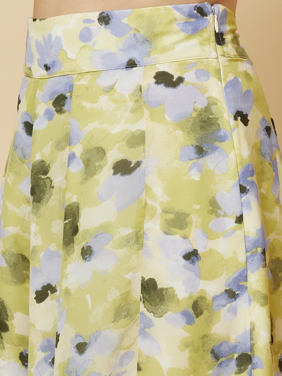 Green floral printed palazzo with one shoulder crop top co-ords for women is a stylish and comfortable outfit choice. The palazzo pants feature a wide-leg cut, providing ease of movement and comfort. The green floral print adds a pop of color and a touch of femininity to the outfit. The one-shoulder crop top is a trendy and flattering choice, showing off the shoulders and adding a touch of elegance to the look. The co-ord set is perfect for a variety of occasions, from casual outings to dressy events. 