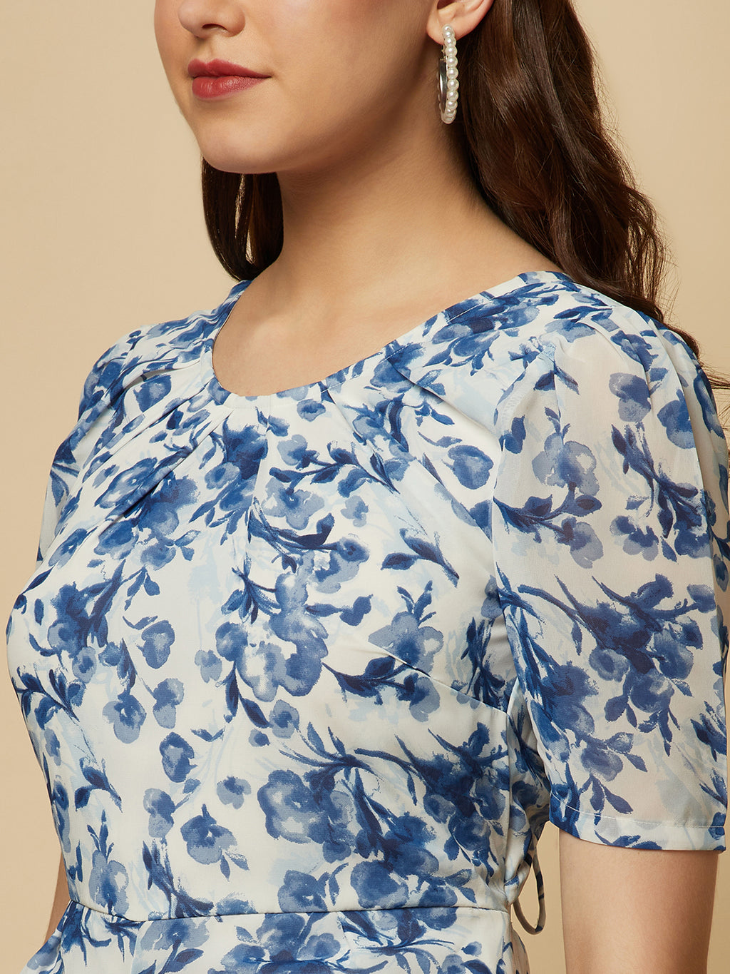 Introducing our stunning Blue Printed Women Jumpsuit With Back Waist Cut and Draw String, the perfect addition to your wardrobe for a stylish and comfortable look.  Crafted from high-quality materials, this jumpsuit is both soft and durable, making it perfect for all-day wear. The back waist cut adds a touch of elegance to the design, while the drawstring ensures a perfect fit that flatters your figure.