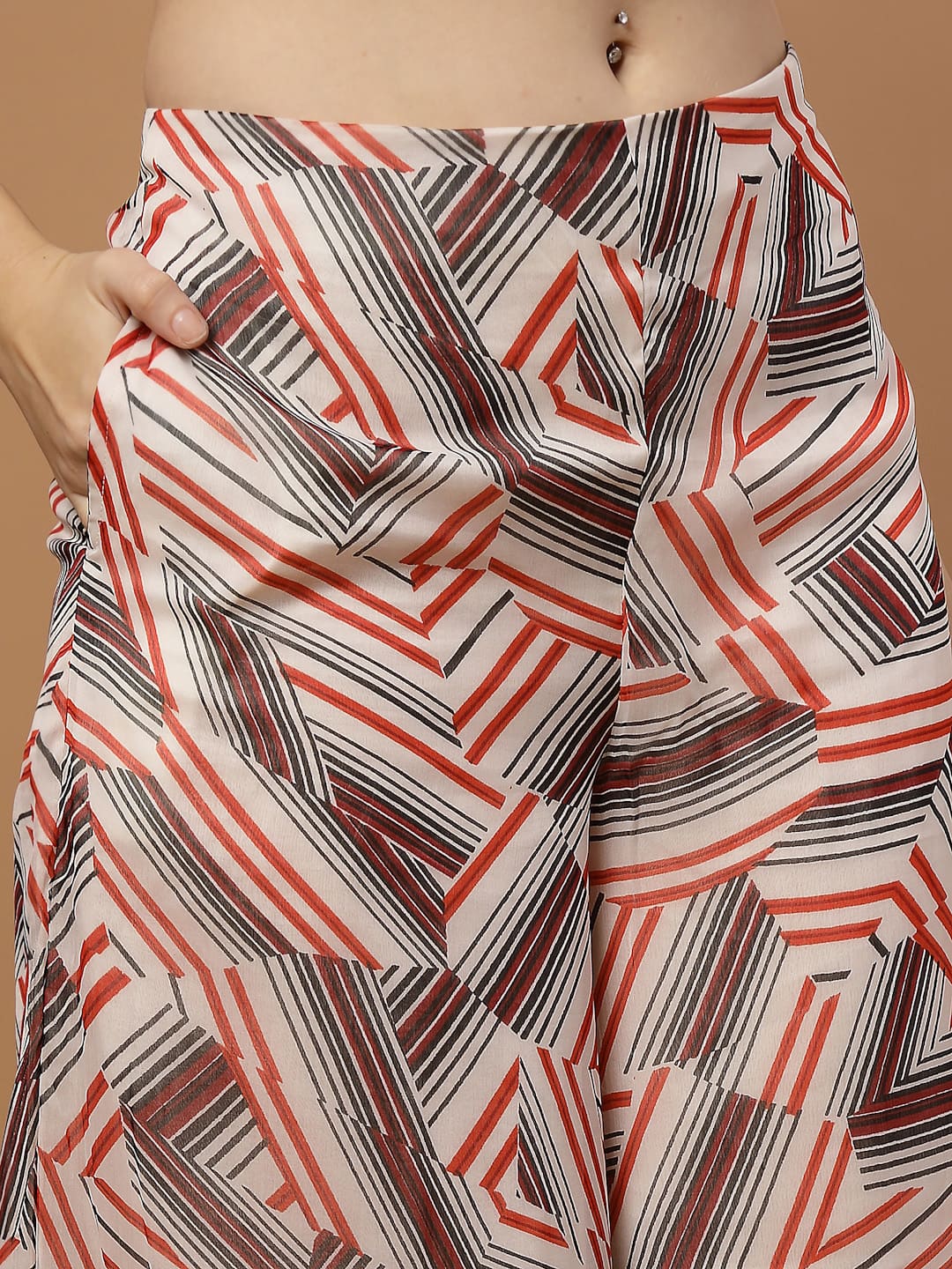 Women’s abstract print layered kurta set with flared pants – chiffon fabric with cotton lining, side zip closure and pocket – festive ethnic wear.