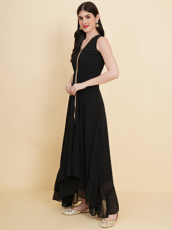 Black  colour long dress for women in georgette. Tailored with V-neck and high low pattern. Finished with a zip closure. It comes with a attached lining.