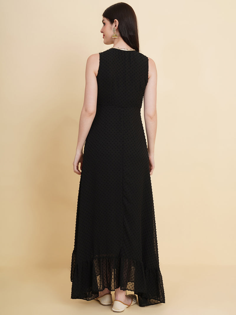Black  colour long dress for women in georgette. Tailored with V-neck and high low pattern. Finished with a zip closure. It comes with a attached lining.