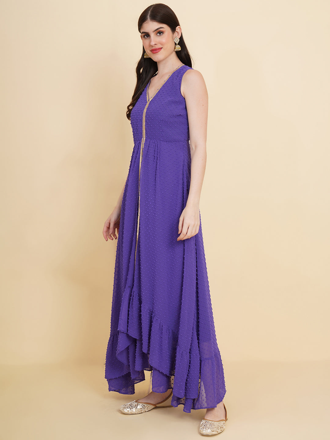 Blue colour long dress for women in georgette. Tailored with V-neck and high low pattern. Finished with a zip closure. It comes with a attached lining.