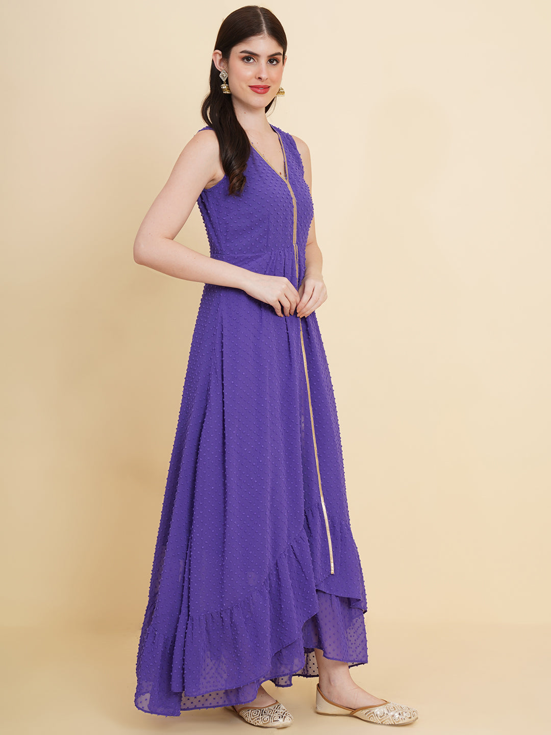 Blue colour long dress for women in georgette. Tailored with V-neck and high low pattern. Finished with a zip closure. It comes with a attached lining.