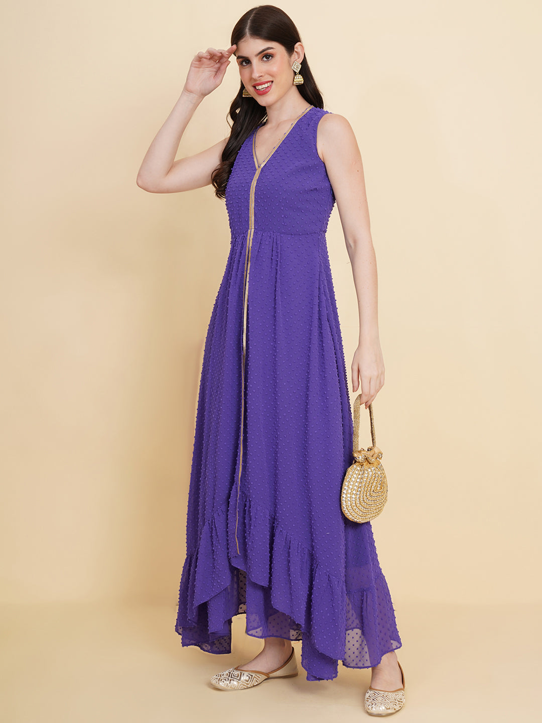 Blue colour long dress for women in georgette. Tailored with V-neck and high low pattern. Finished with a zip closure. It comes with a attached lining.