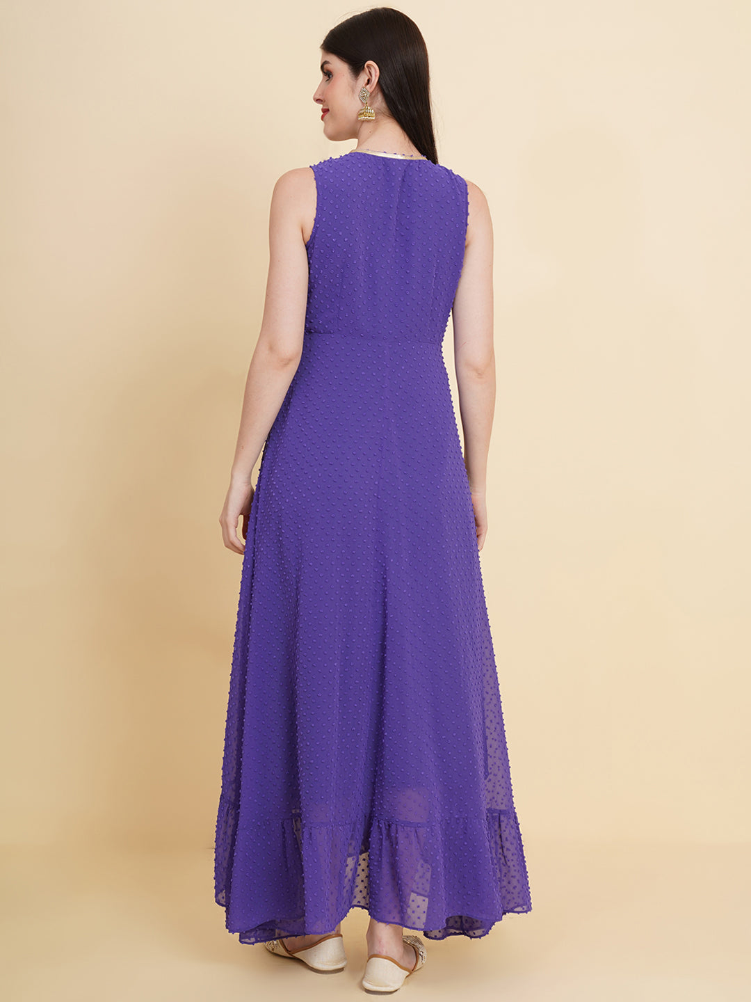 Blue colour long dress for women in georgette. Tailored with V-neck and high low pattern. Finished with a zip closure. It comes with a attached lining.