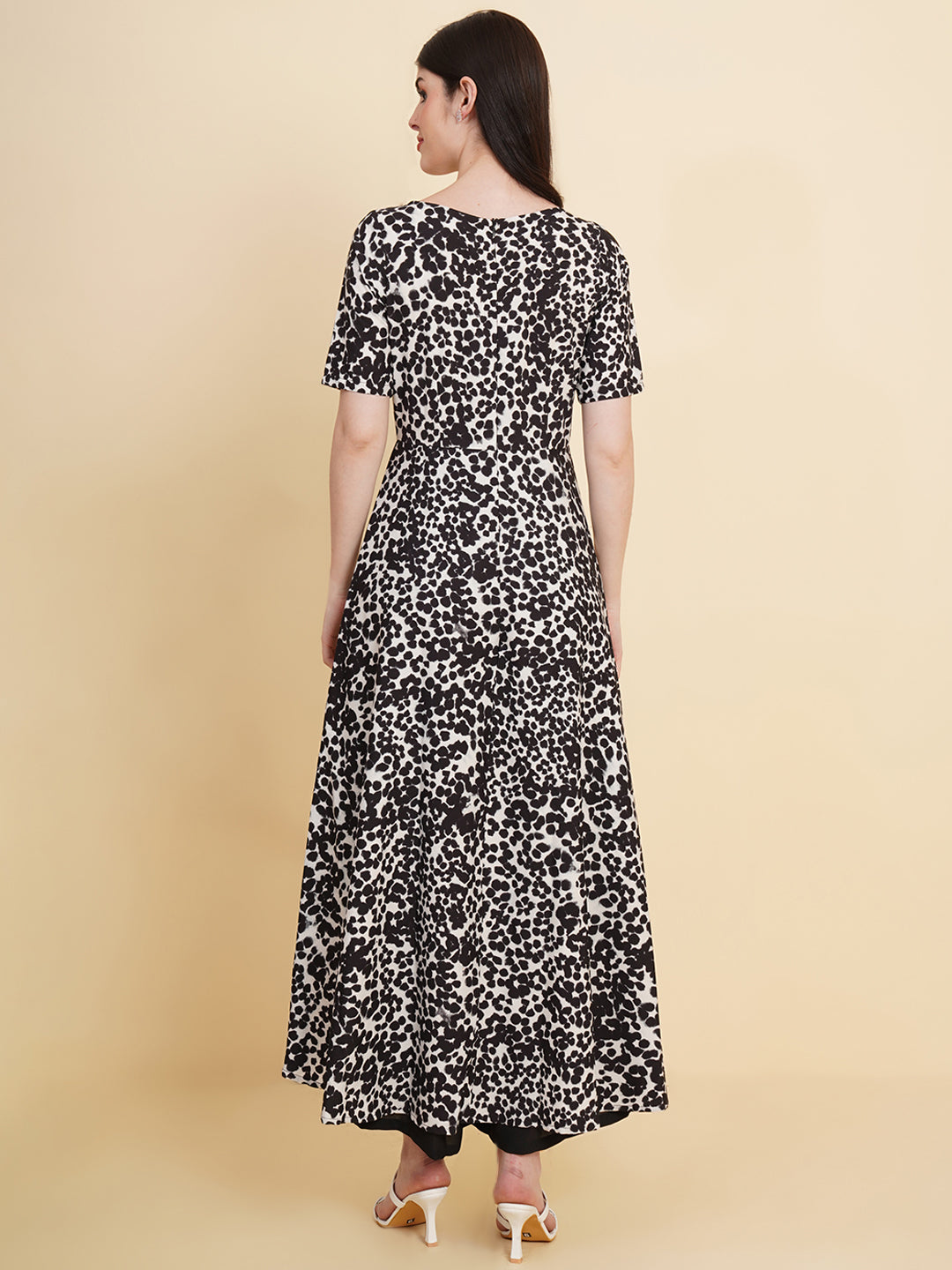 Make a stylish statement by this all time favourite jumpsuit for women, whether its official meetings or family gatherings, this will surly turn heads.  Zip Closure at Back | Fabric Crepe | Lining attached