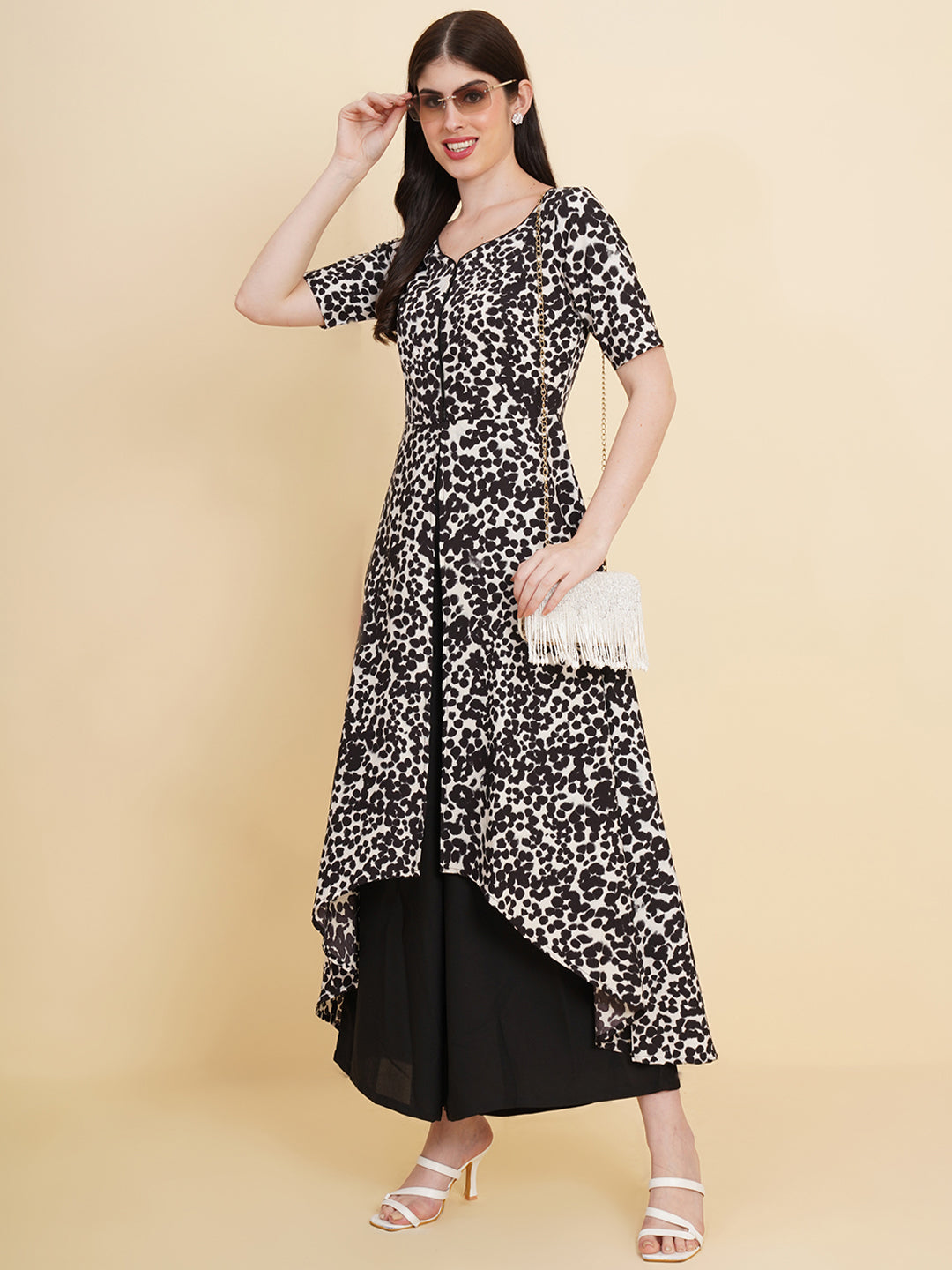 Make a stylish statement by this all time favourite jumpsuit for women, whether its official meetings or family gatherings, this will surly turn heads.  Zip Closure at Back | Fabric Crepe | Lining attached