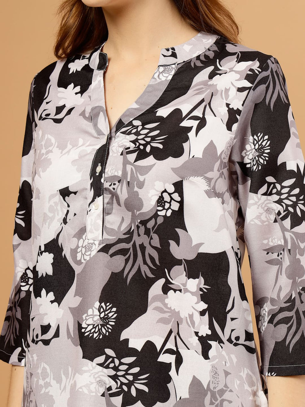 Black and white tropical printed kurta with matching bottoms, featuring soft breathable fabric and coordinated design for casual or festive wear, kurta close up view.