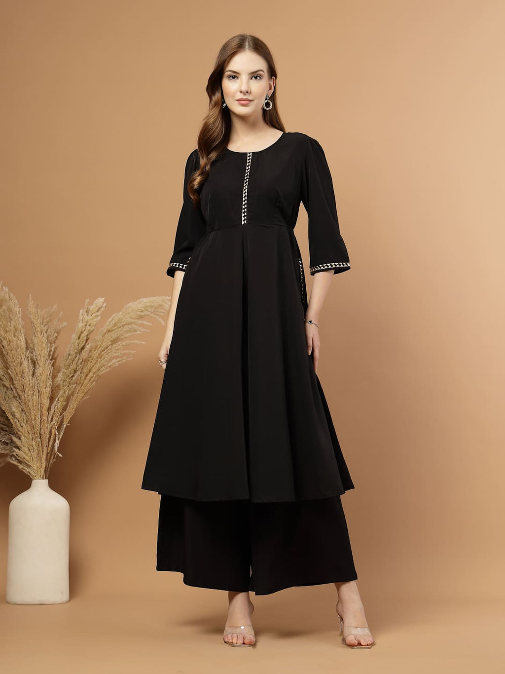 Black Circular Flared Kurta Set for Women, festive ethnic outfit with beautiful flare and stylish design – great for Indian festivals and casual occasions.- Front View 