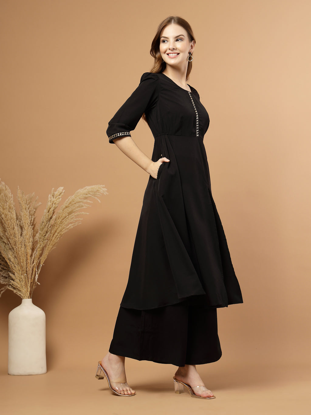 Black Circular Flared Kurta Set for Women, festive ethnic outfit with beautiful flare and stylish design – great for Indian festivals and casual occasions.- Side View