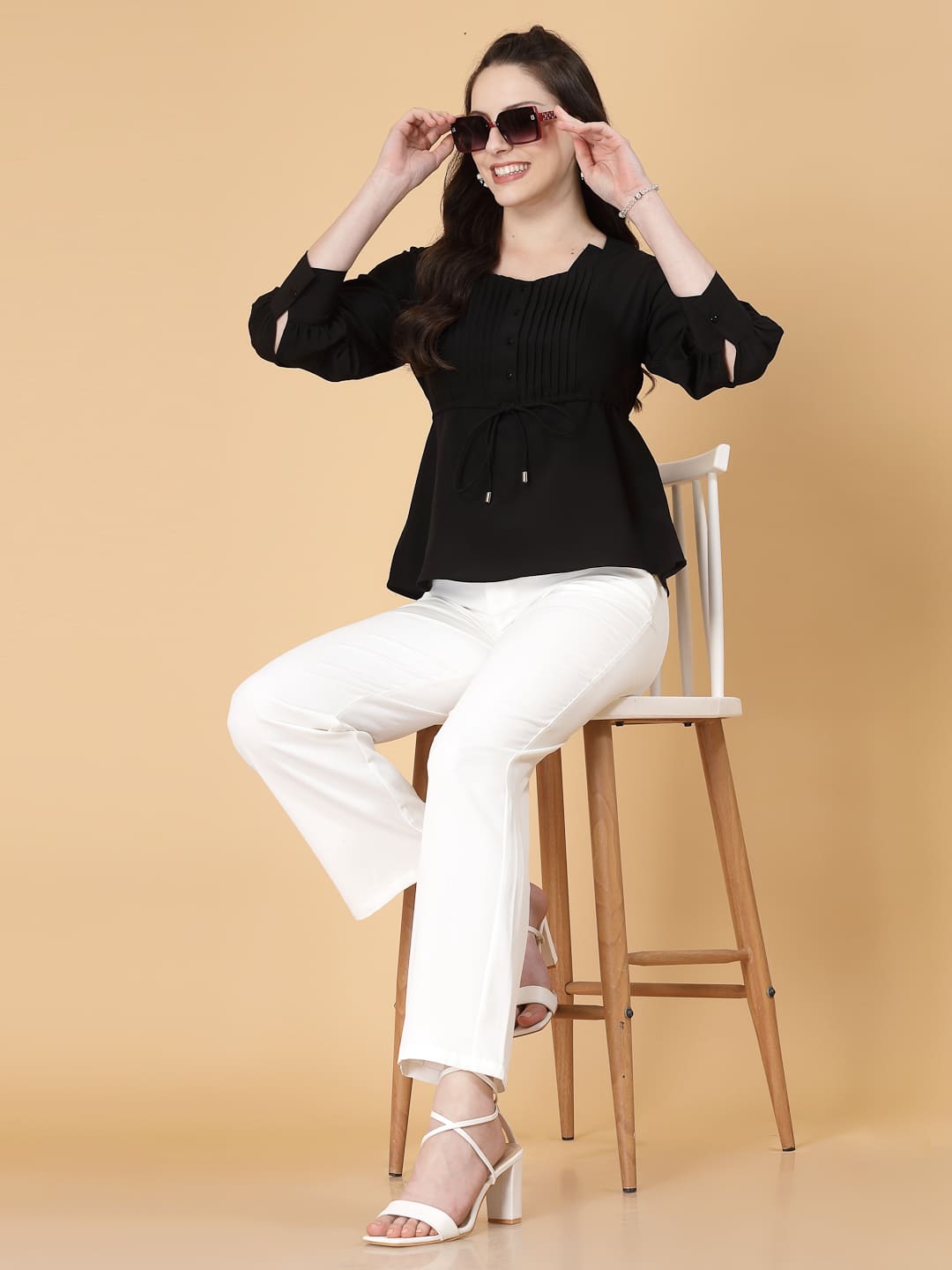 Effortlessly chic. Work-ready. This solid blouse with pintuck detail adds a touch of polish to your Formal outfit.&nbsp;Cuffed sleeves, drawstring waist, and pintuck charm. Dress it up or down this blouse does it all.


Solid color, pintuck detail, and a touch of cinch. Your new Formal blouse For Work.