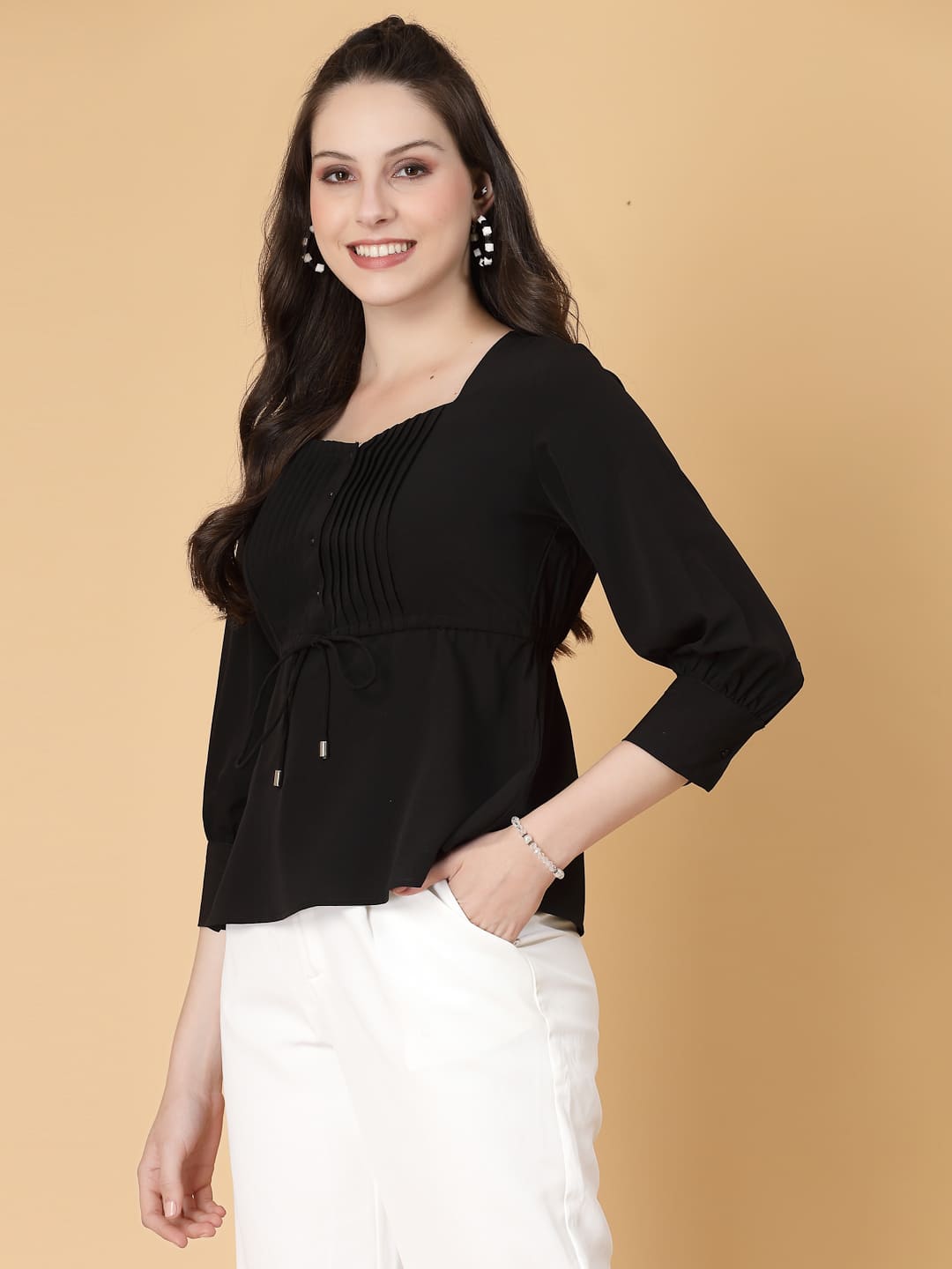 Effortlessly chic. Work-ready. This solid blouse with pintuck detail adds a touch of polish to your Formal outfit. Cuffed sleeves, drawstring waist, and pintuck charm. Dress it up or down this blouse does it all.
Solid color, pintuck detail, and a touch of cinch. Your new Formal blouse For Work.