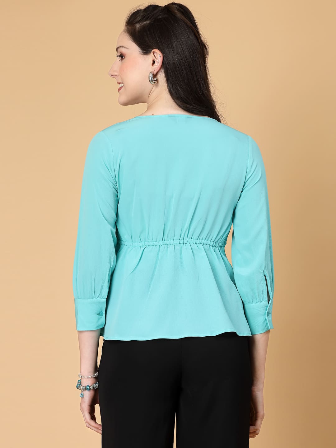 Turquoise color, pintuck detail, and a touch of cinch. Your new Formal blouse For Work.