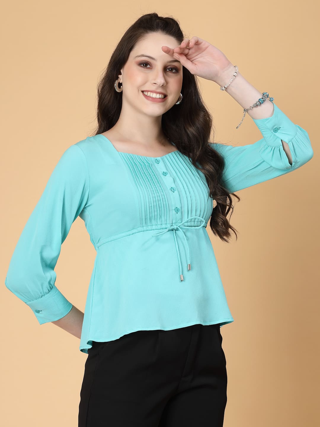 Turquoise color, pintuck detail, and a touch of cinch. Your new Formal blouse For Work.