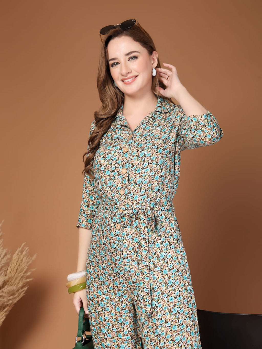 Green Rayon Printed Jumpsuit for Women, elasticated waist front button and tie up belt – Summer Casual Wear 3/4 view