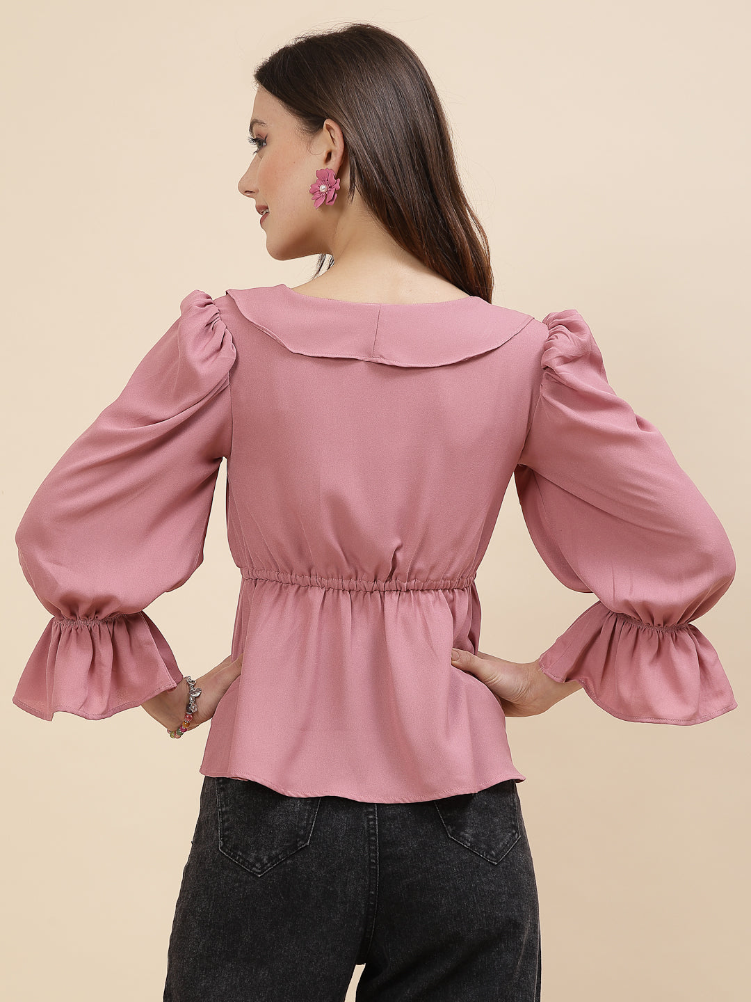 This cute long sleeve top for women and girls is perfect for any occasion. In a soft, charming pink, it's an ideal "going out" top that combines style and comfort. The long sleeves make it suitable as an evening top, adding a touch of elegance to your holiday party outfit. Whether you're dressing up for a festive event or just a casual night out, this top will make you stand out beautifully.