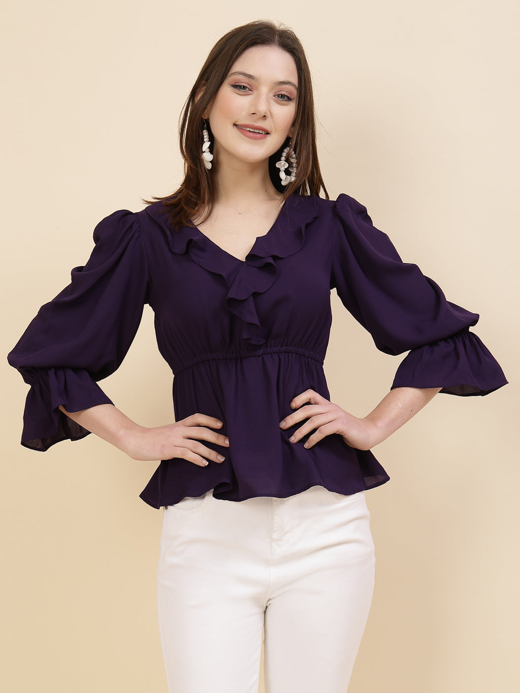Chic and sophisticated stylish top for women is a perfect blend of contemporary elegance and timeless charm. This exquisite piece features a beautifully ruffled neckline that adds a touch of romance and femininity to your ensemble. The ruched waist not only enhances your silhouette but also adds a modern twist, creating a flattering and fashionable look.